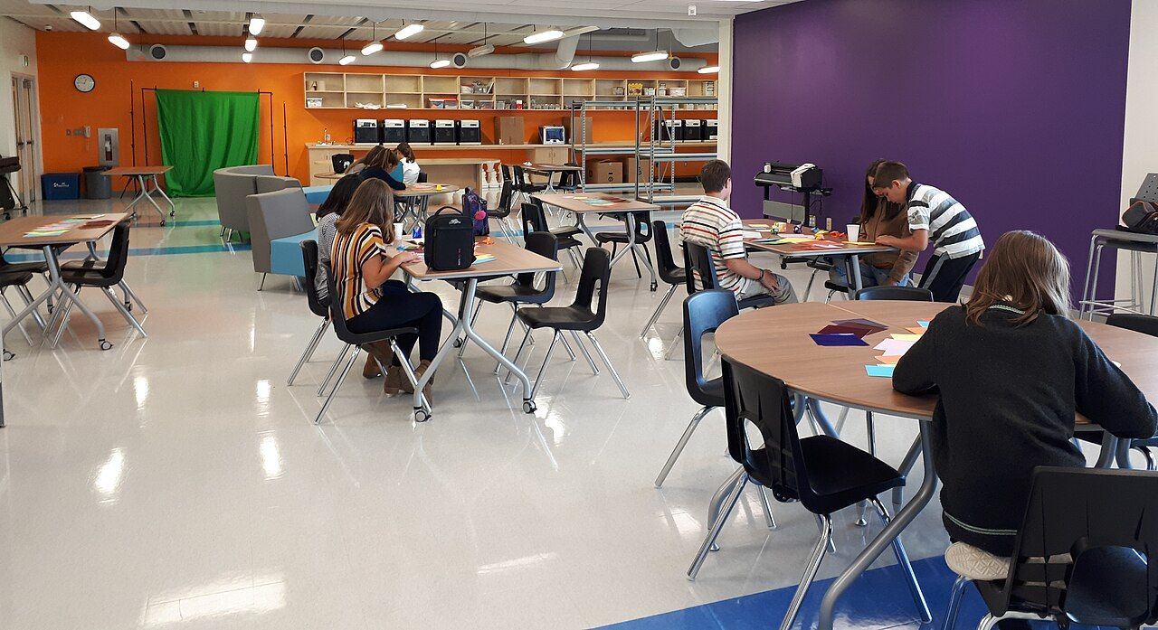 Students working in a school creative space in Canada